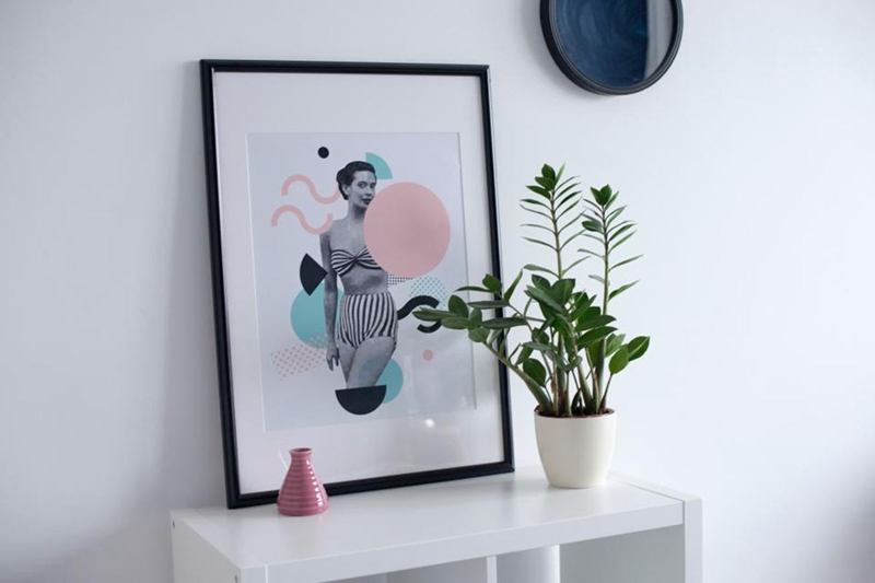 Framed print on a white wall, mind the wall plug holes