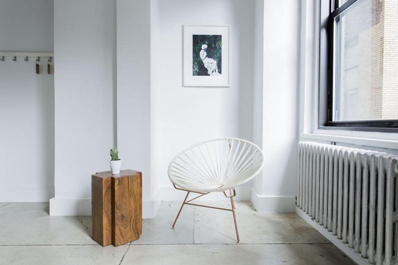 Bright room with clean white window frames and radiator